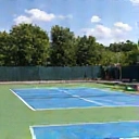 Stylized icon representing tennis court